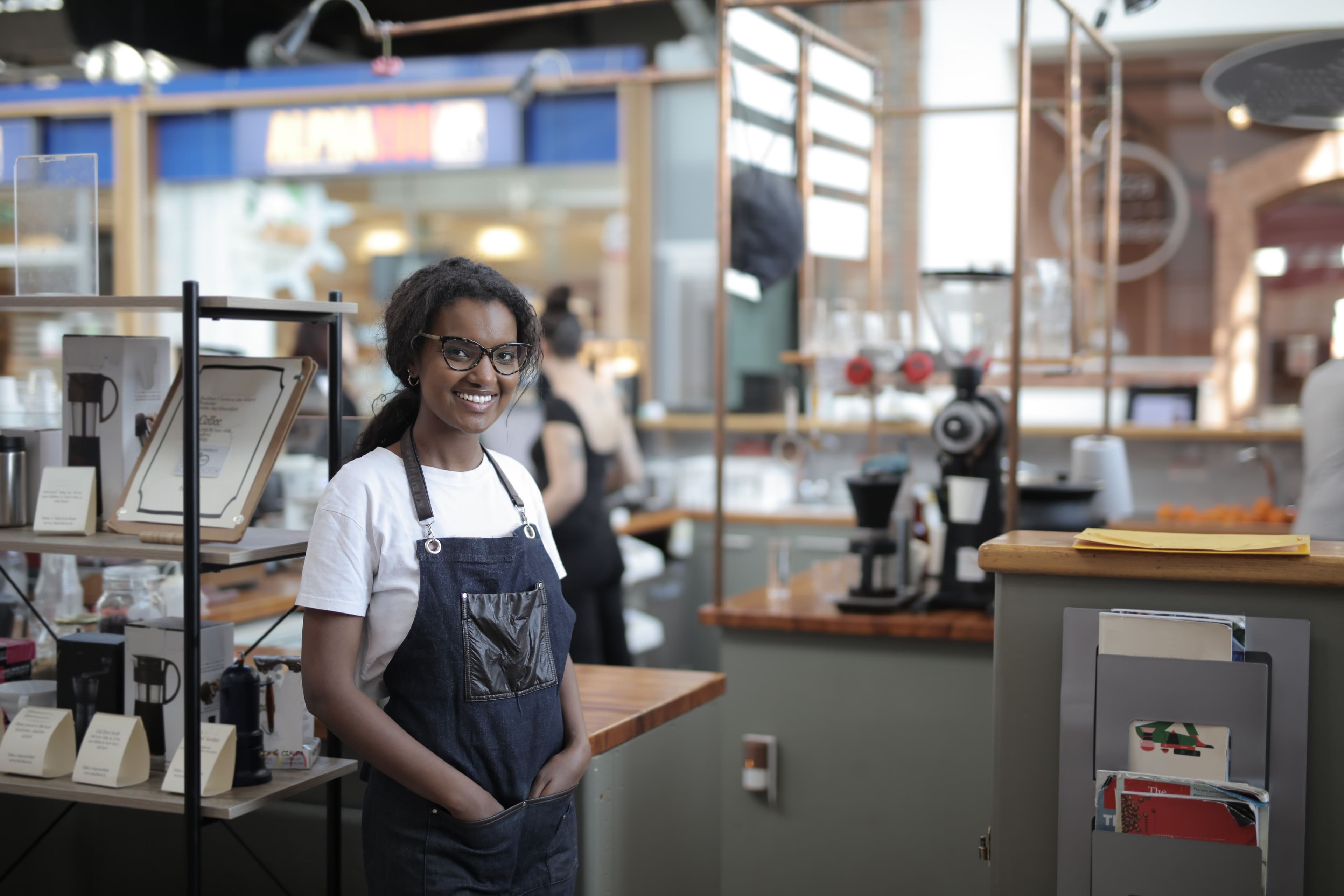 A Ghanaian shop owner running her business